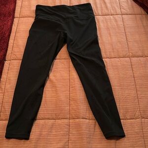 Ladies athleta elation7/8 tight in black in med has pinhole print